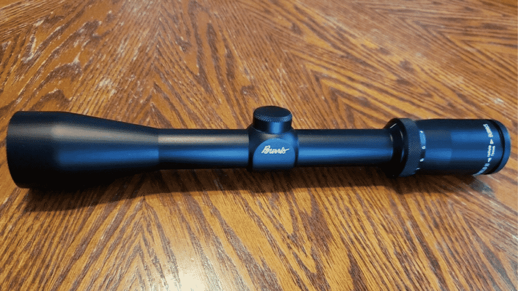 Burris 3-9x40mm Rifle scope sitting on wooden kitchen table.